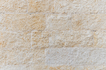 abstract background of an old stone wall close up