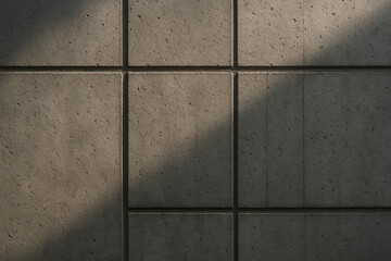 Modern concrete grid wall texture with natural sunlight and shadow. Architectural background.