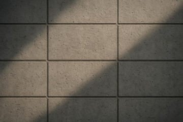 Modern concrete grid wall texture with natural sunlight and shadow. Architectural background.