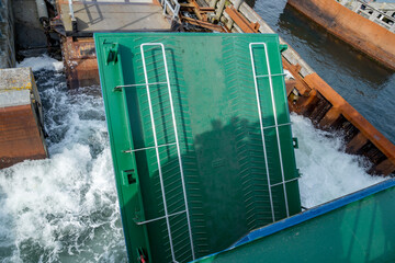 Green metal bow door on a Danish ferry