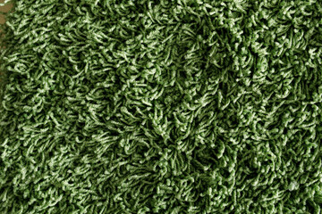 High-resolution image of a lush green shag carpet texture. Perfect for backgrounds or design...