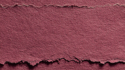 Close-up of torn kraft paper with rough edges. Natural beige texture ideal for backgrounds, eco design, scrapbooking, packaging, or handmade crafts