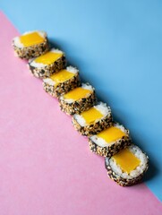 Colorful Sushi Rolls on Vibrant Background