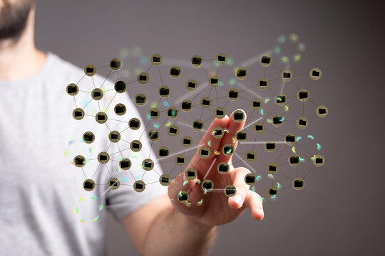 Hand interacting with a network of digital files, representing data sharing or cloud storage.