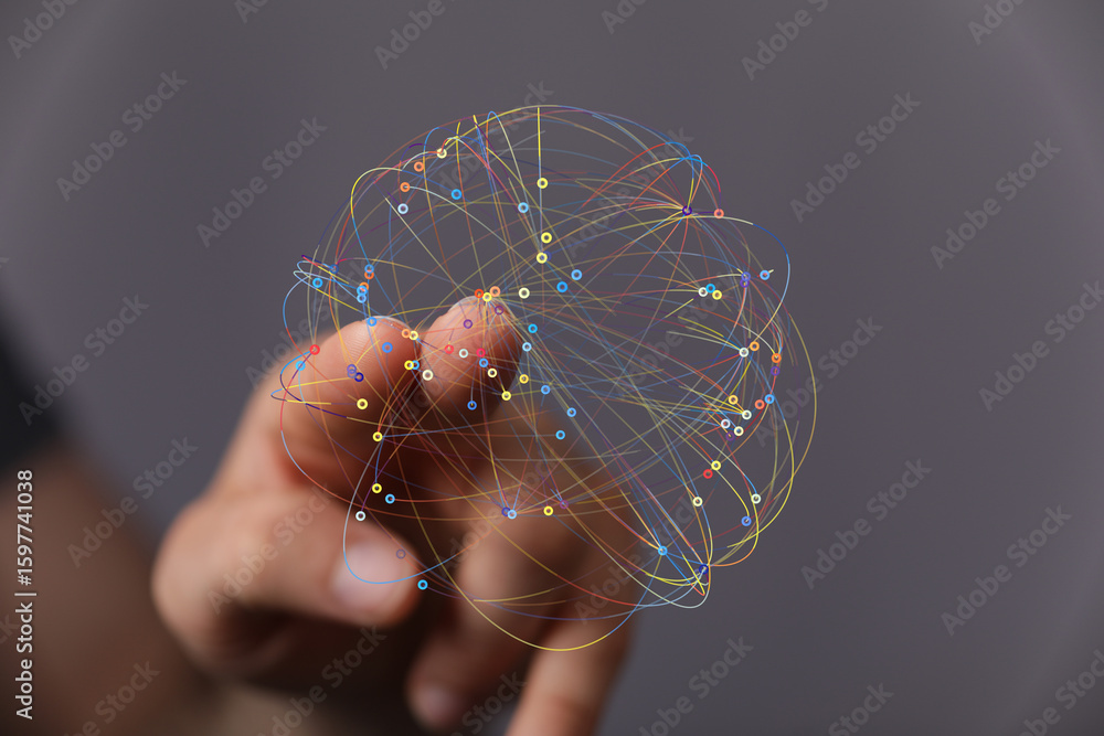 Poster abstract image of a hand interacting with a colorful network visualization, representing global conn
