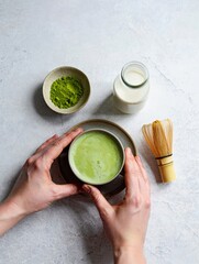 Fresh Matcha Preparation with Hands and Ingredients