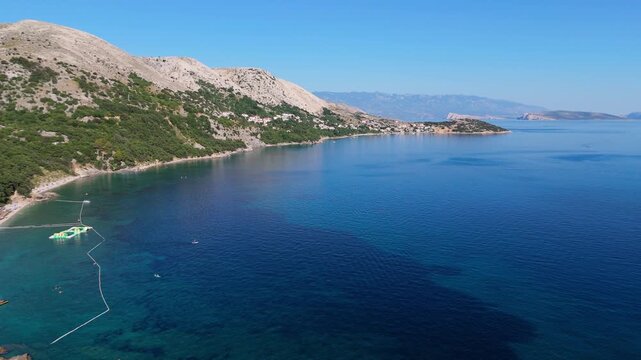 Campsite at Campig Skrila, Krk Island, Stara Baska Croatia, Aerial View of the Mountains and Coast With Boats, Beaches and Adriatic Sea. The Seaside Rv Campmobiles on a Summer Beautiful Coastline