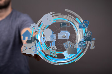 Stock photo of a person interacting with a digital interface showing various app icons and network...