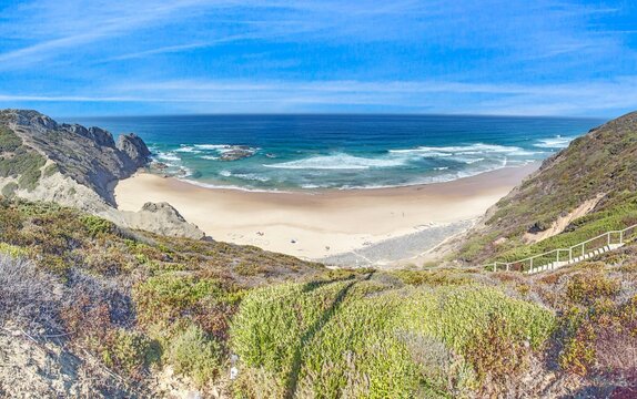 Bordeira beach with cliffs and surf Portugal