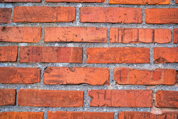 Obraz premium The old red brick wall. Brick wall of red color, old red brick wall texture background.