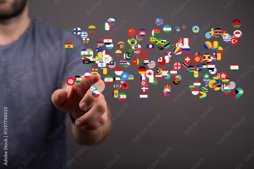 Poster image of a hand interacting with a digital display of world flags, symbolizing global connection and