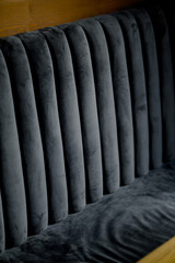 Detail of a sofa with grey upholstery