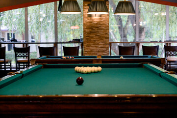 Billiard Table with balls and cue