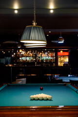 Billiard Table with balls and cue