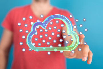 Person interacting with a digital cloud, showcasing secure data storage and easy access.