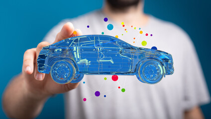 Person interacting with a digital car model, showcasing future automotive technology.