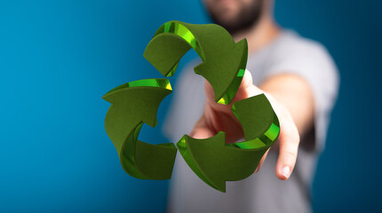 Eco-friendly concept. Man showcases a 3D recycle symbol. Sustainable living.