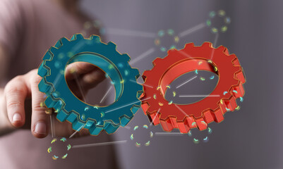 Image of two gears working together, representing teamwork, collaboration, and synergy in business.