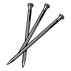 Three black knitting needles crossed on white double pointed craft