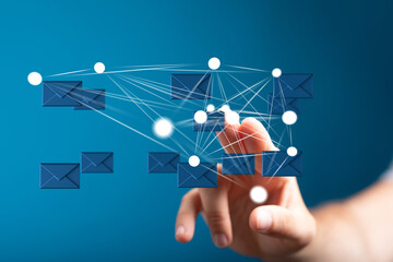 Hand interacting with digital email network.  Modern communication technology.