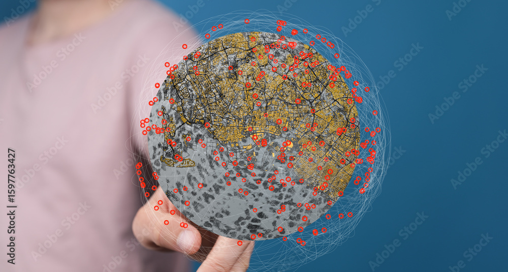 Poster person holding a digital globe showing interconnected data points. ideal for technology, networking,