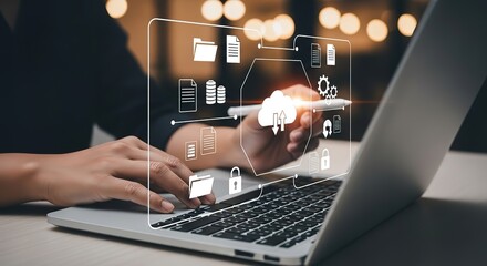 Person using a laptop with a glowing digital interface overlay showing data and security icons