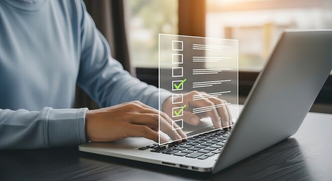 Person typing on a laptop with a digital interface displaying data and progress bars