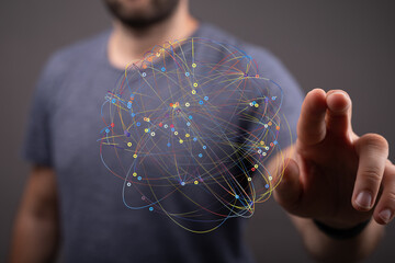 Abstract image of a man interacting with a digital network.  Perfect for technology, connectivity,...