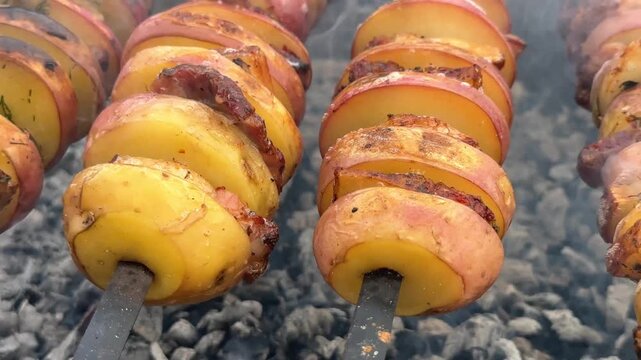 Grilled potatoes with bacon outdoor cooking