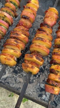 Grilled potatoes with bacon outdoor cooking