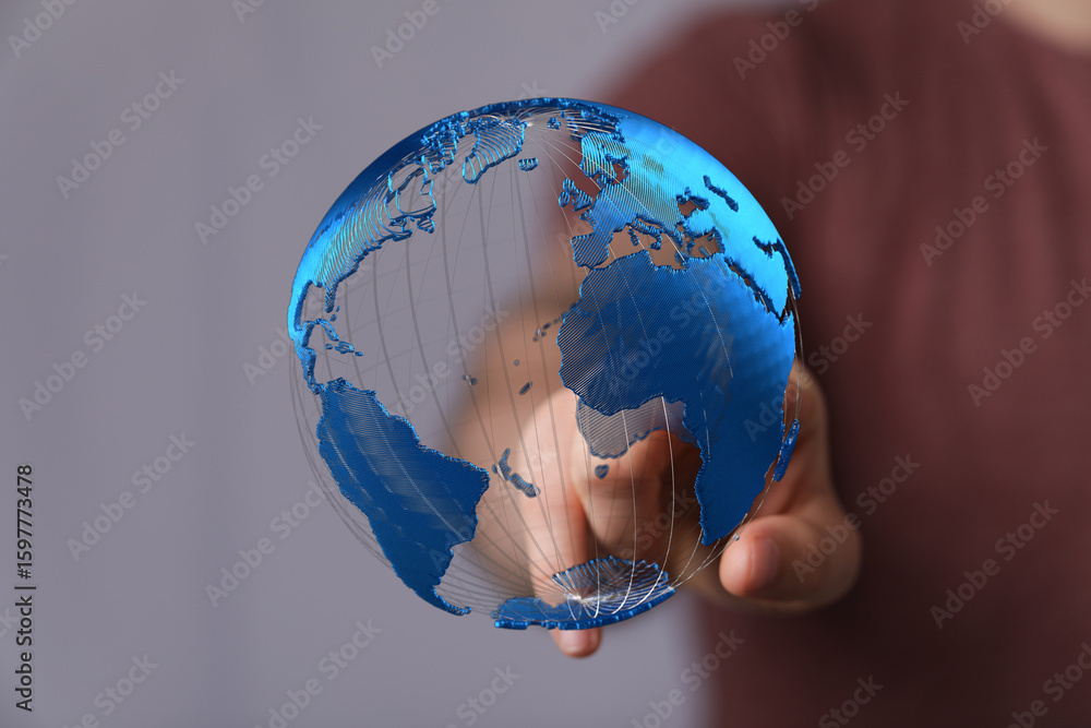 Poster high-tech image of a person interacting with a digital globe, representing global connections and ne