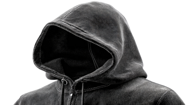 Mystery Hoodie: A close-up shot of a hooded sweatshirt, with an enigmatic and faceless presence that invites introspection and embodies anonymity, and concealing identity