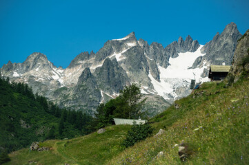 mountain landscape in the alps with snow and blue sky