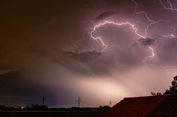 Thunderstorm with lightning near Tabertshausen, Aholming, Deggendorf, Bavaria, Germany