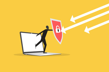 Businessman hold shield on computer laptop protect cyber attack