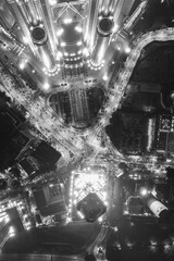 Urban sprawl unfolds beneath a canopy of night lights