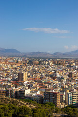 Aerial view of Alicante, Spain, showcasing dense urban development with a mix of residential...