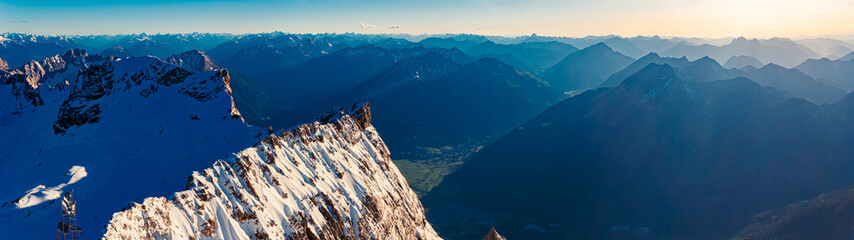 High resolution stitched alpine summer evening panorama at Mount Zugspitze, Top of Germany,...