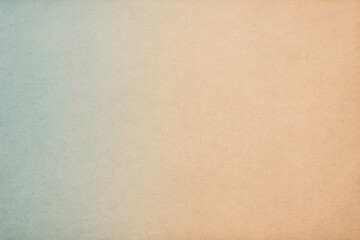 Vintage paper background texture with a soft pastel gradient from blue to warm beige