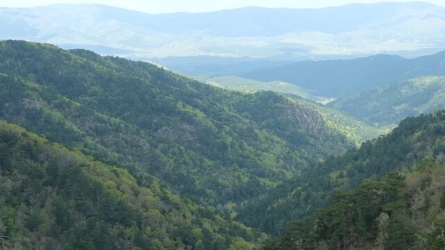 Breathtaking panoramic view of lush green mountains from the top of Kaz Mountains, Turkey. Ideal for travel, nature, and scenic landscape footage.