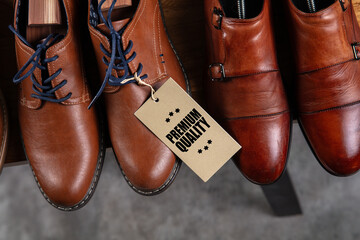 Premium Leather Shoes with Quality Tag on Wooden Shelf