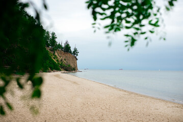 View of the sea cliff. Beach. Relaxation by the sea.