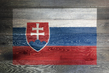 Slovakia flag on rustic old wood surface background