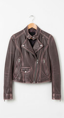 Naklejka premium Deep chocolate faux leather jacket with structured wide lapels and silver zipper, showcasing modern edgy design on hanger.