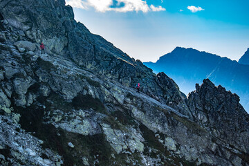 rocky mountain trail with chains