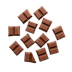 Milk chocolate bar pieces isolated on white background. Chocolate chunks Top view. Flat lay