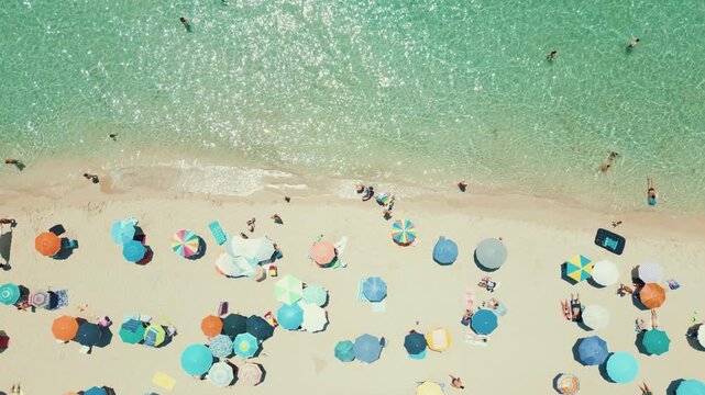 Puglia from Above: Colorful Umbrellas and Crystal Clear Sea