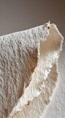 Obraz premium Closeup View Of Layered White Paper With Subtle Beige Tones
