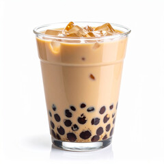 a full, clear glass of iced beverage sits on a white surface. dark, round spheres are clustered at the bottom of the glass