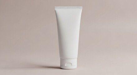 Clean cosmetic tube mockup on neutral pastel background – skincare or beauty product branding template